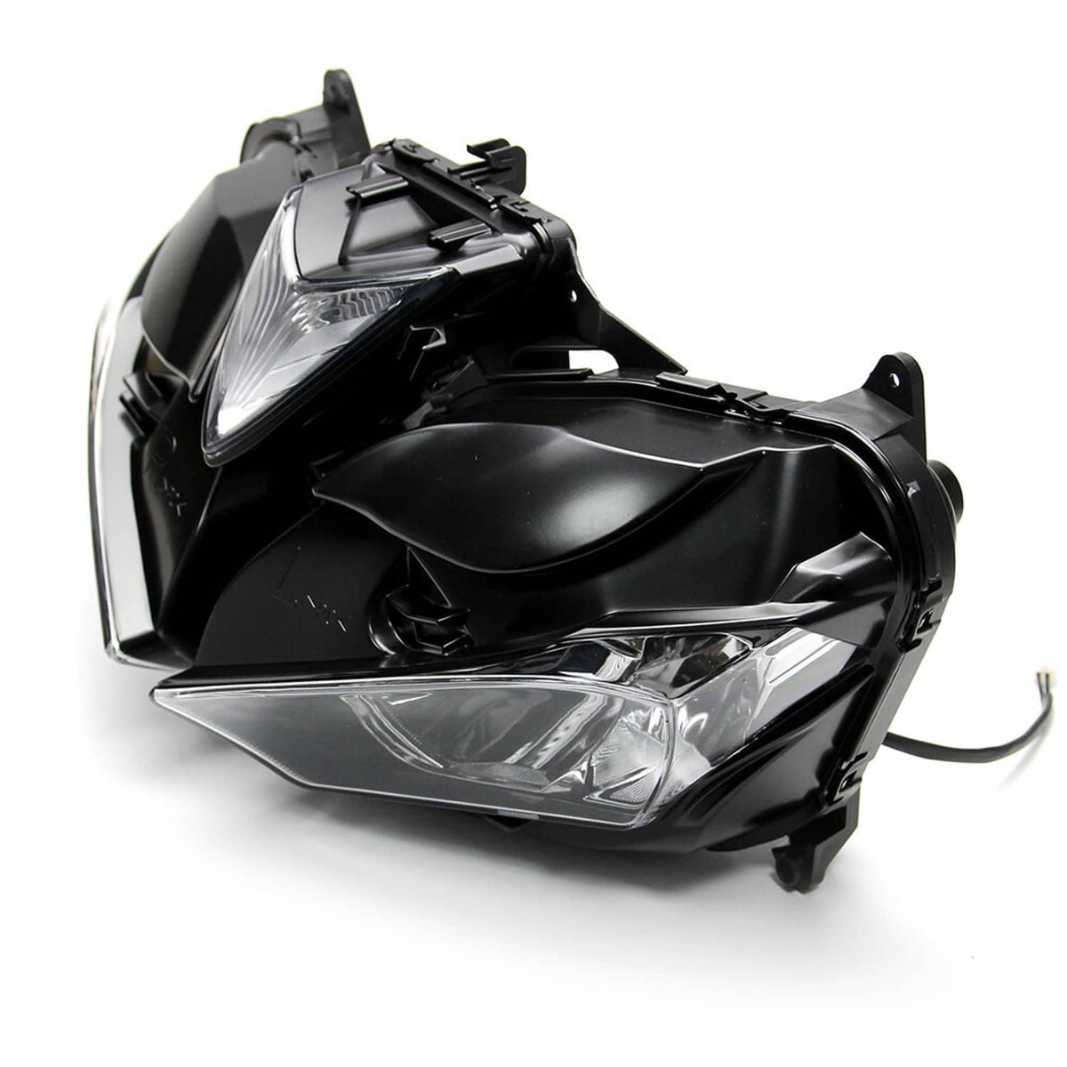Front headlight assembly, angled view with black housing, clear low-beam lens, wiring.