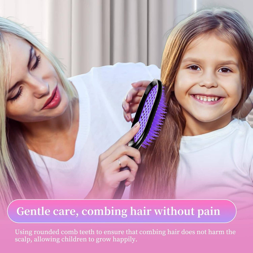Pink vented detangling hair brush with black handle used on a child’s hair