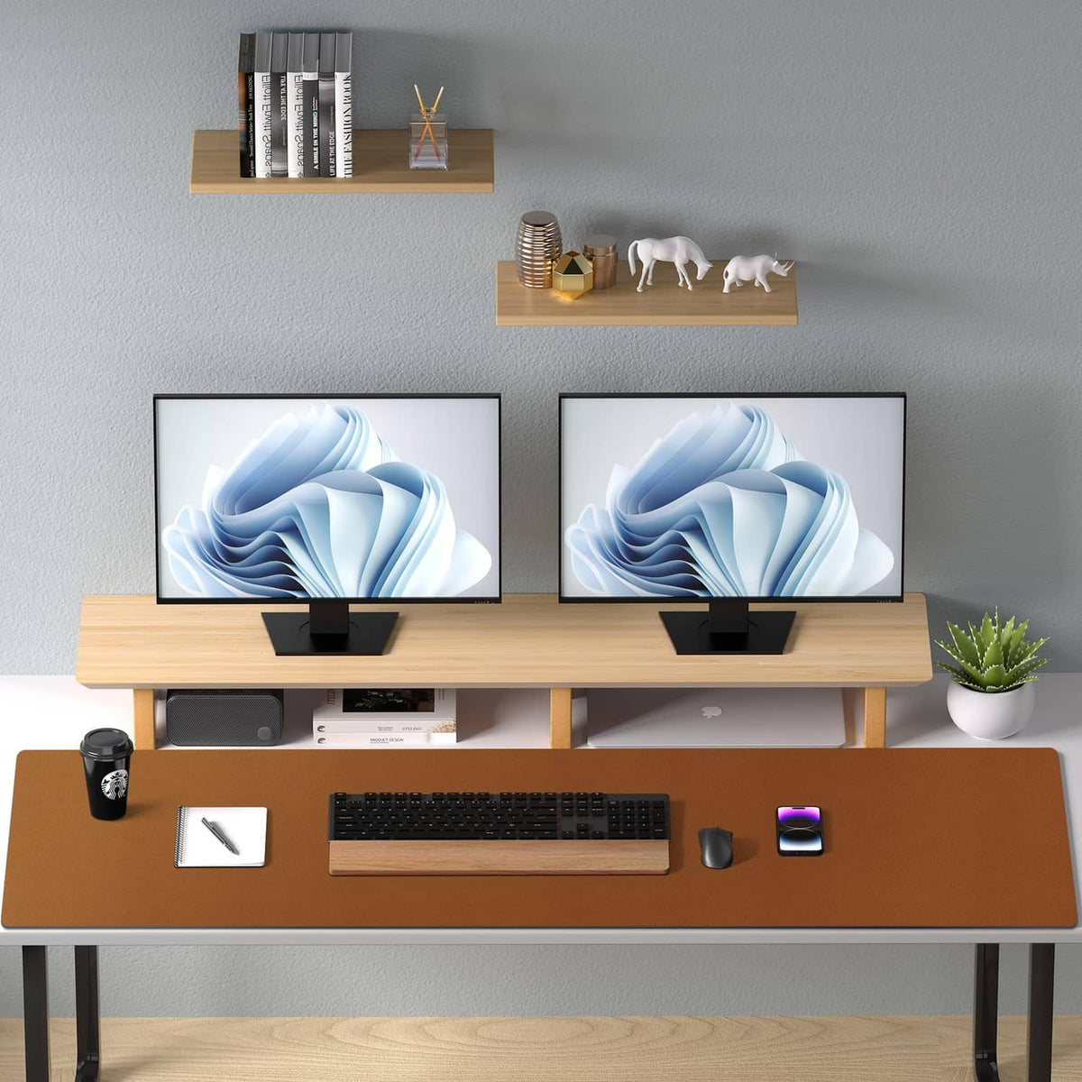 Brown desk pad protector on office desk under computer setup with mouse