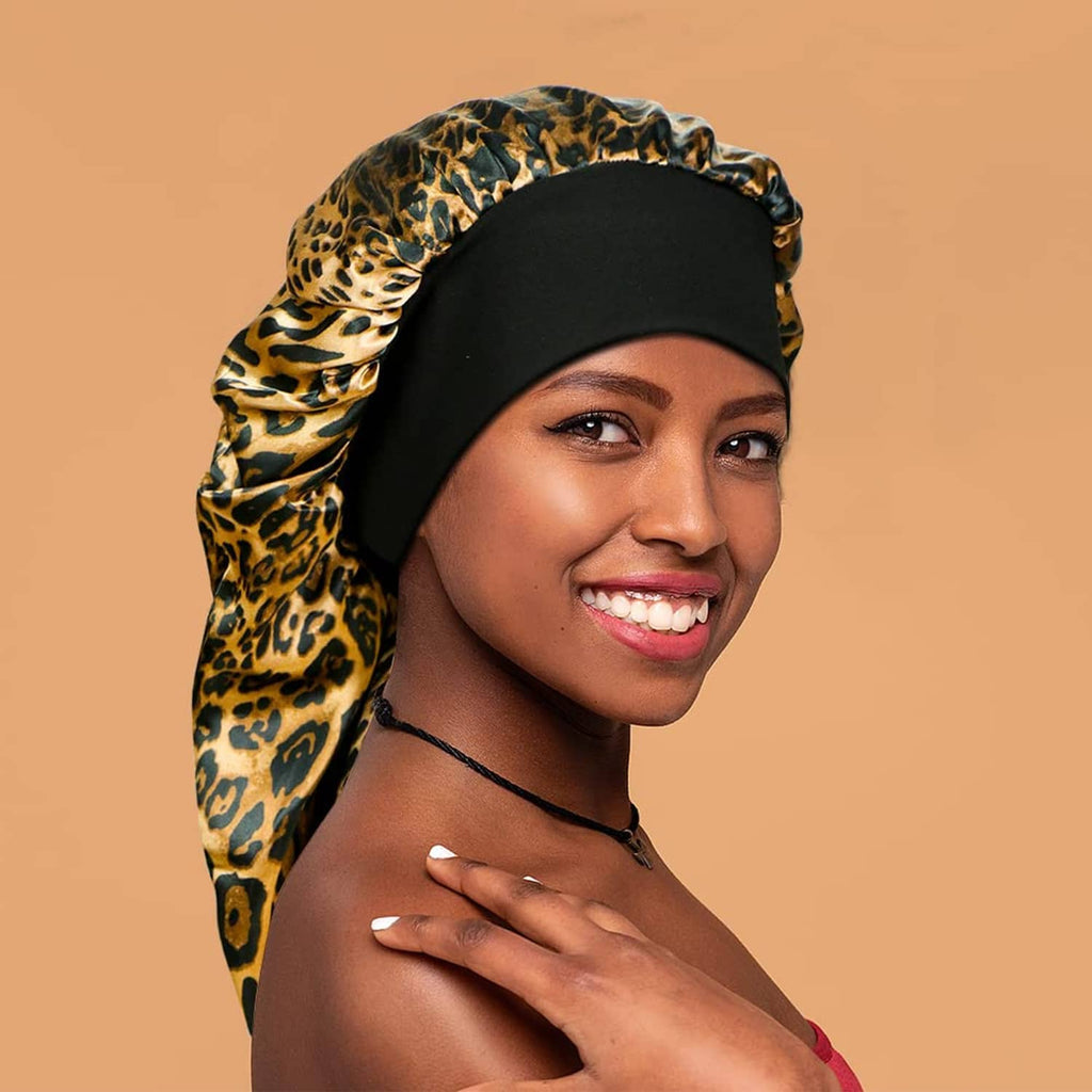 Leopard print sleep bonnet with black base band and chin tie detail