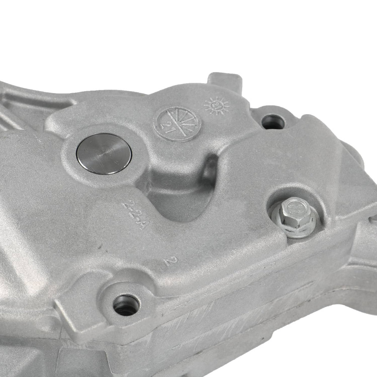 Oil pump top cover with stamped markings and bolt holes, aluminum body