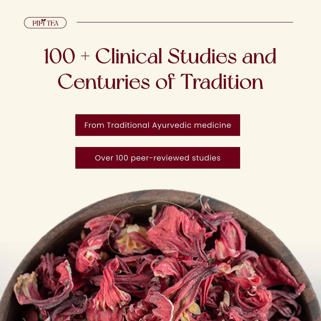Dried hibiscus tea petals in a bowl, deep ruby-red flower pieces