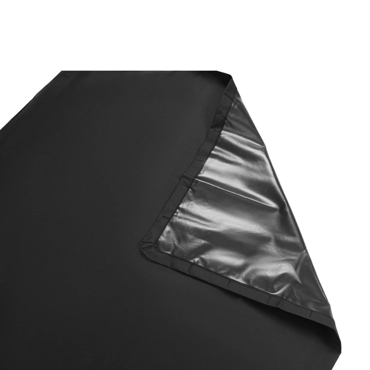 Close-up of black canopy corner with stitched edge and folded fabric panels.