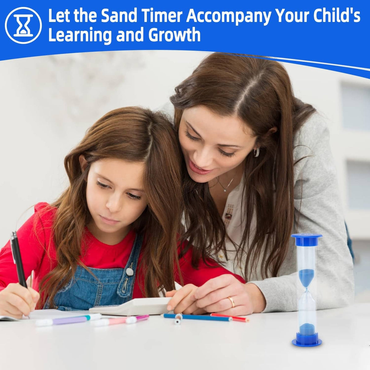 Plastic sand timer hourglass on table with blue top cap and blue sand