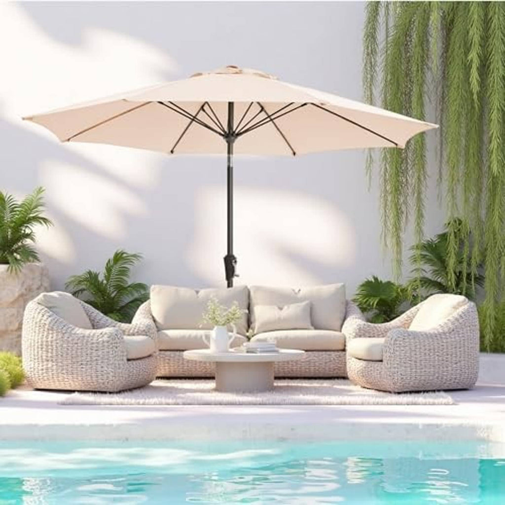 Beige outdoor umbrella with open canopy and central pole.