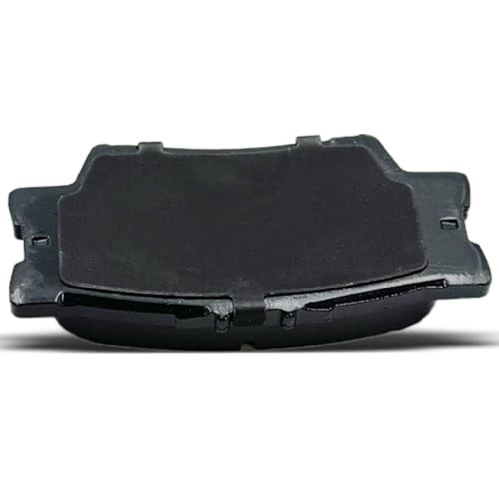 Ceramic brake pad pair close-up, black non-friction side with metal edges