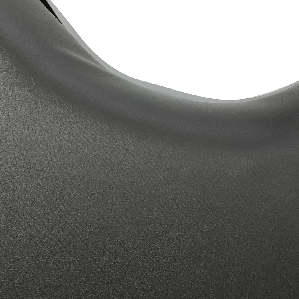 Black faux-leather style back cushion, close-up curved edge
