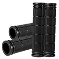 Four-piece black rubber bike handlebar grips, raised square grid texture and end caps