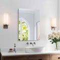 Rectangular frameless bathroom mirror with glossy silver reflective surface