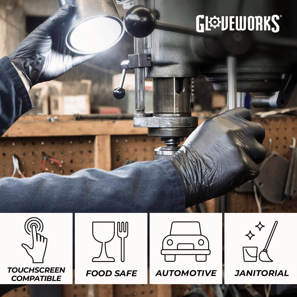 Black nitrile glove on hands near metal tool, demonstrating dexterous grip