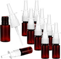 Set of dark amber nasal spray bottles with white fine mist sprayers and caps