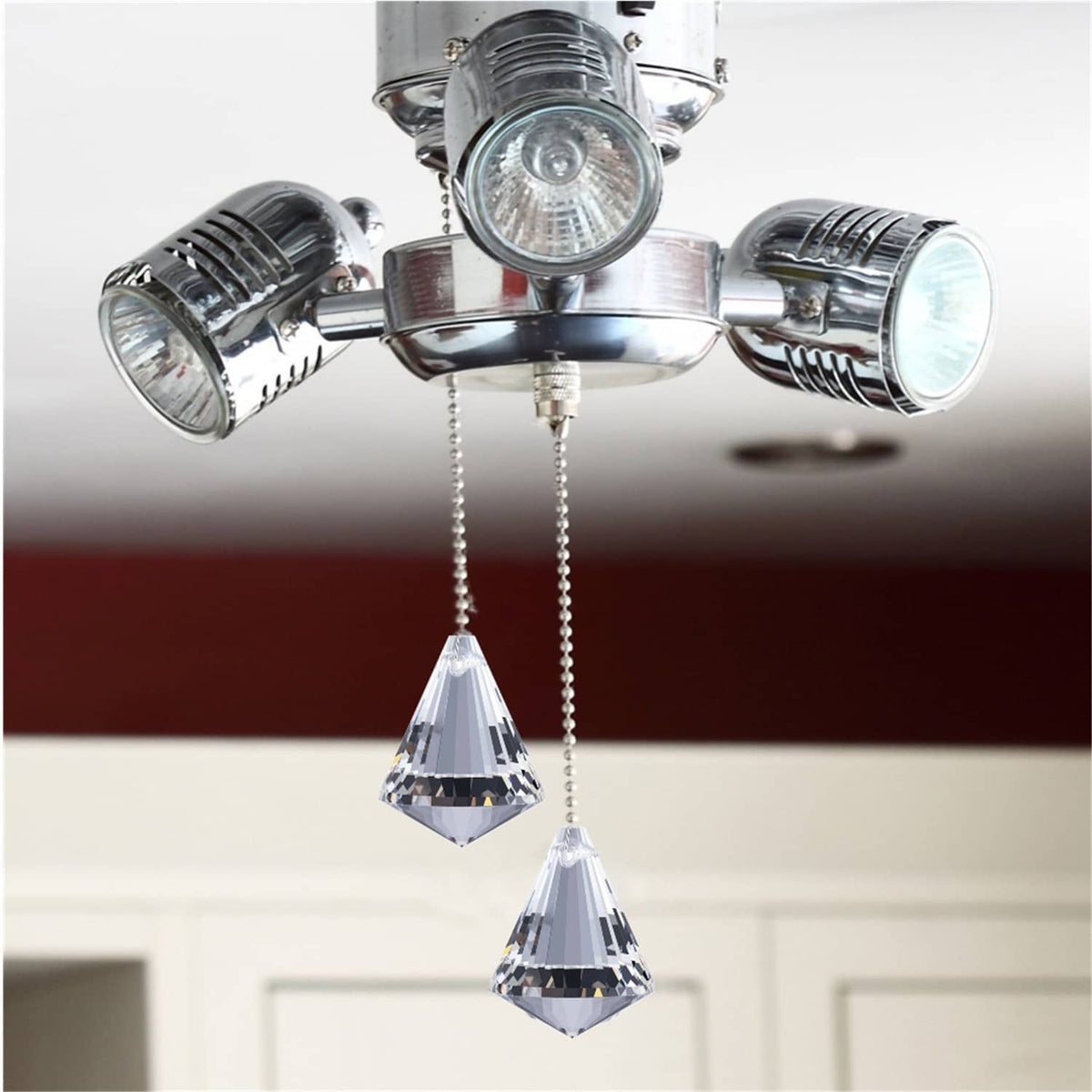 Ceiling fan light pull chain ornament with faceted teardrop prisms hanging on bead chain