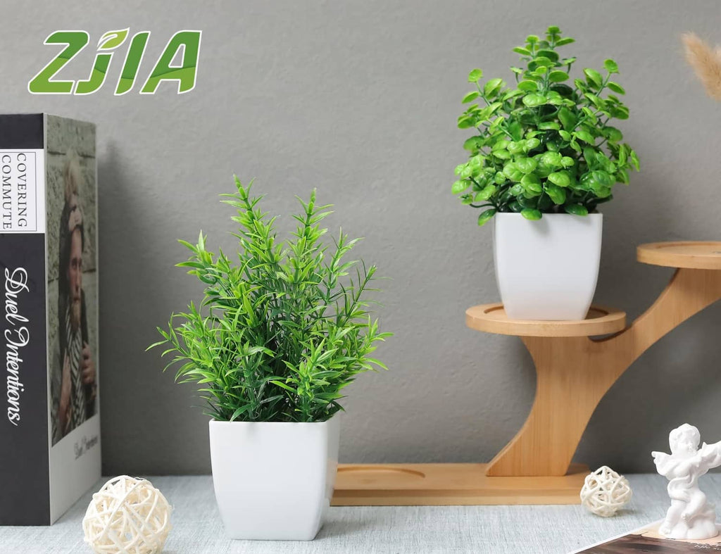 ZJIA 2-pack artificial plants: two small green plants in white square pots.