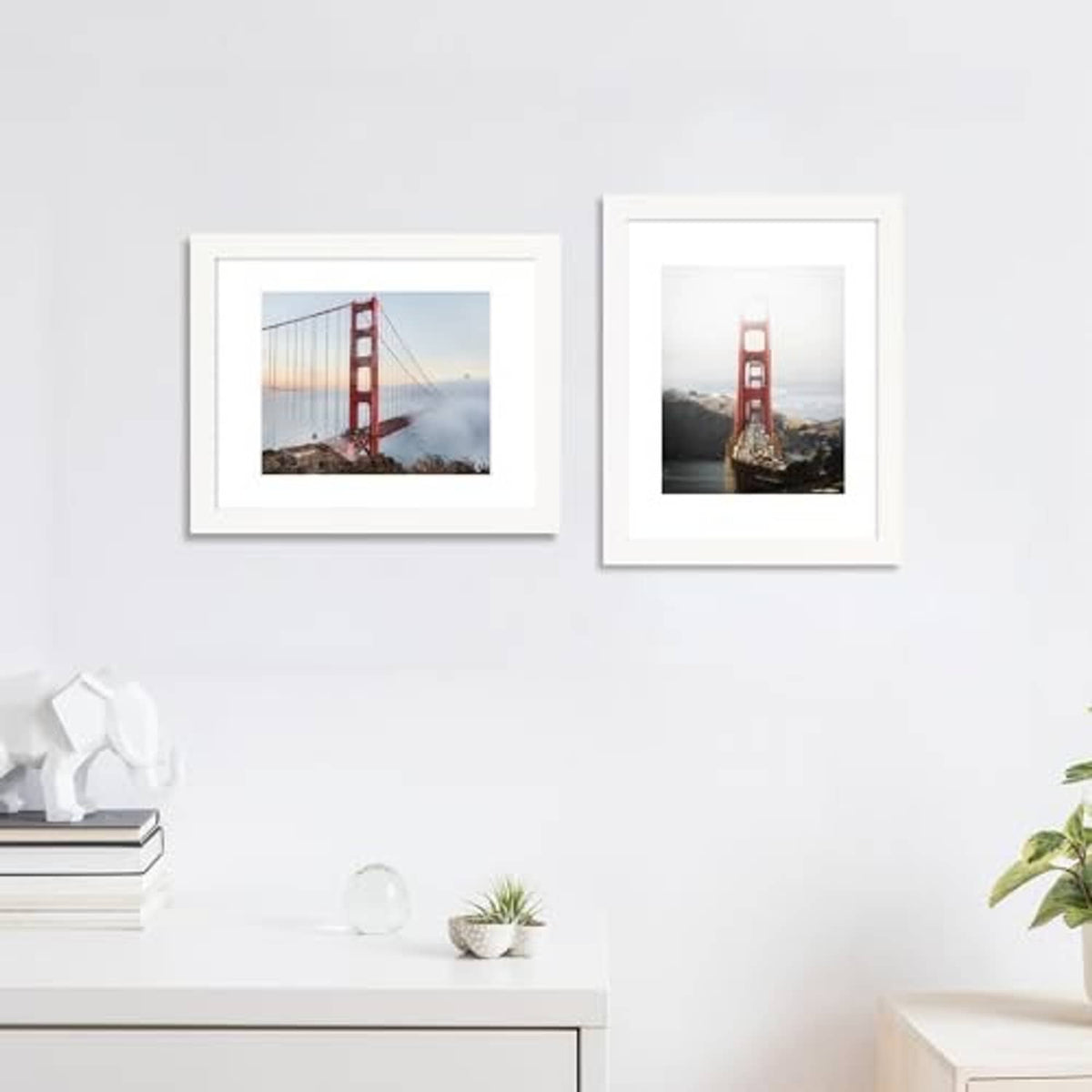 White wall-mount picture frames with real glass and white mat showing landscape photos