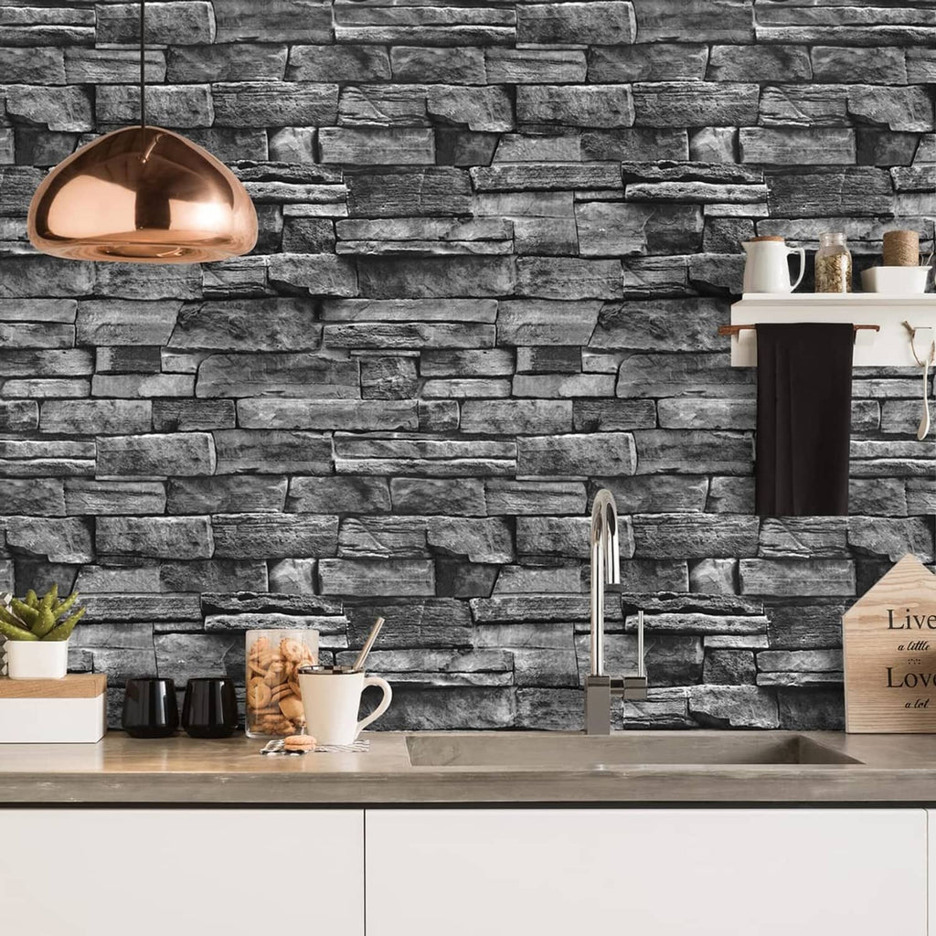 Dark gray stacked-brick wallpaper covering a kitchen sink wall.