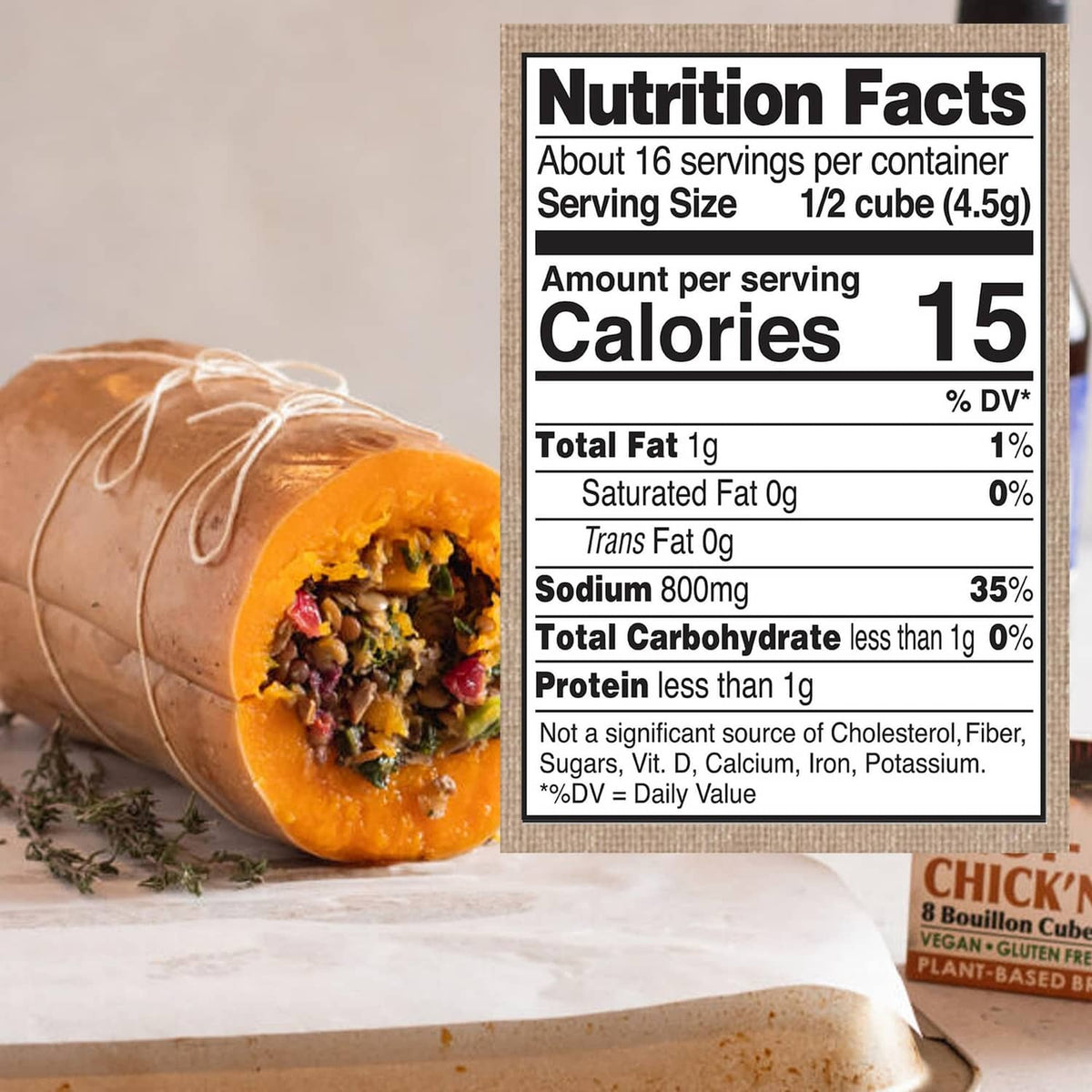 Half bouillon cube with vegetable bits, next to Nutrition Facts panel