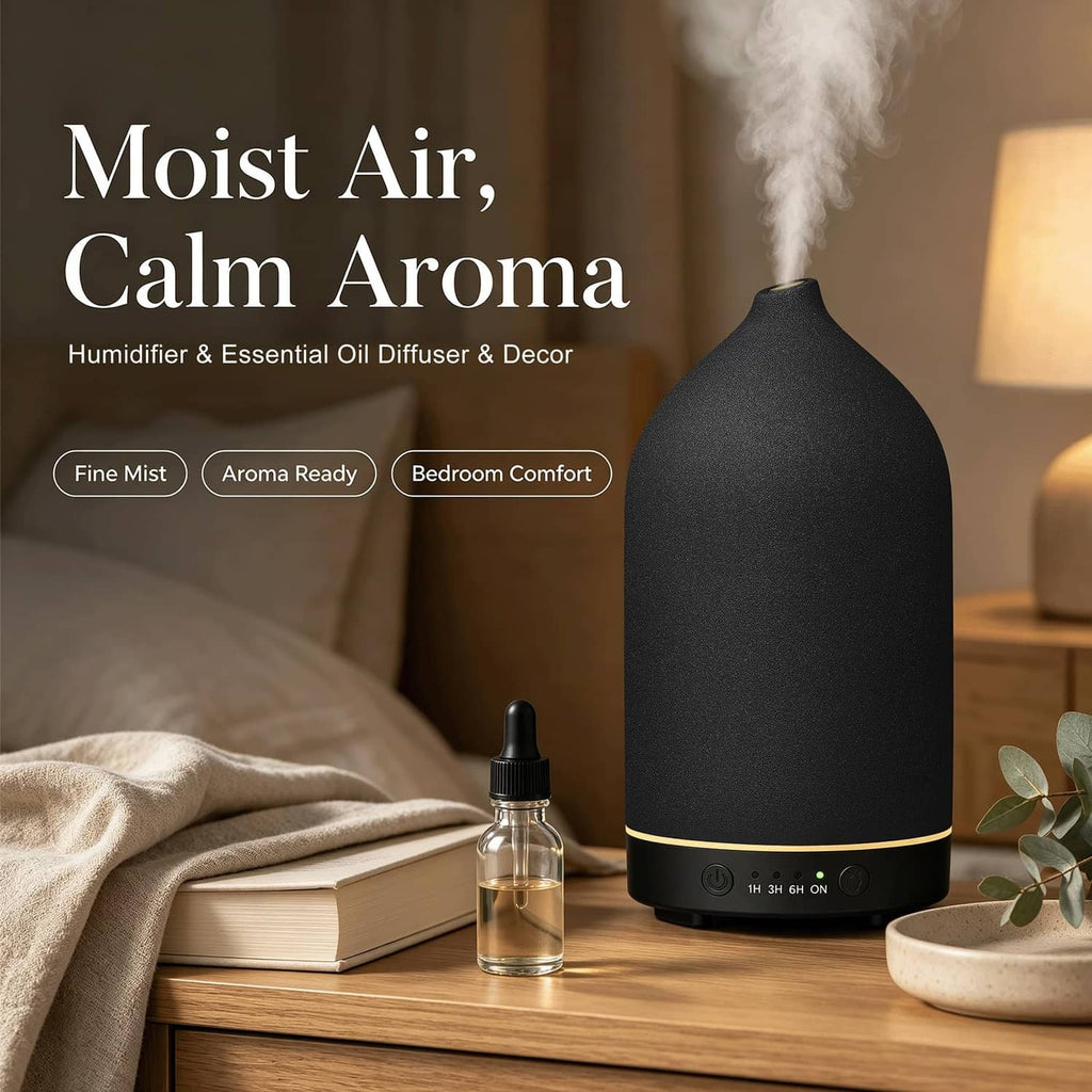 Black ceramic essential oil diffuser with mist spout and small essential oil dropper