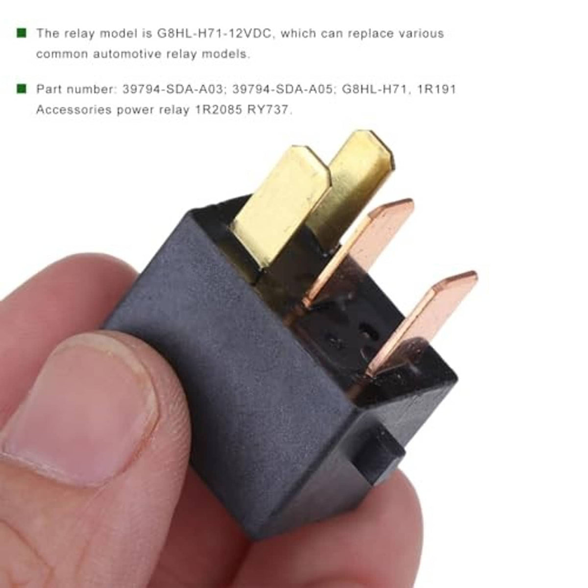 Handheld black 4-pin relay with copper and gold-toned metal contacts
