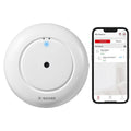 Soft white round water leak detector with X-SENSE logo