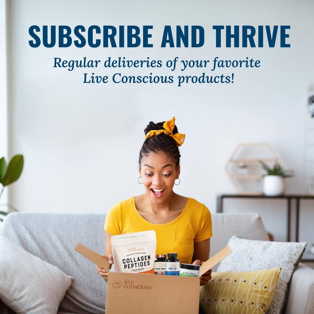 Woman holding a collagen supplement box while reading subscription mail