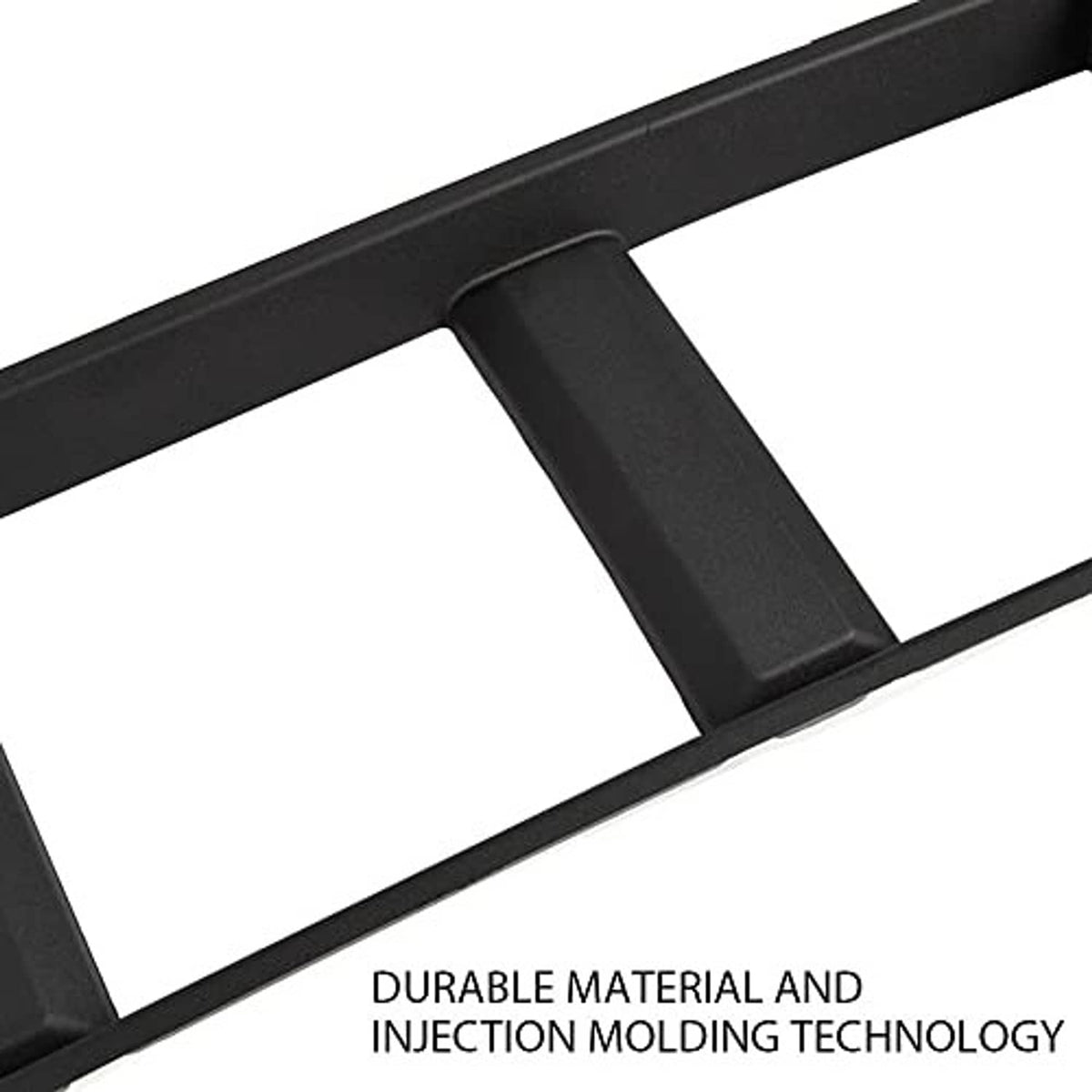 Front bumper lower grille trim panel detail, black textured edge and slat frame