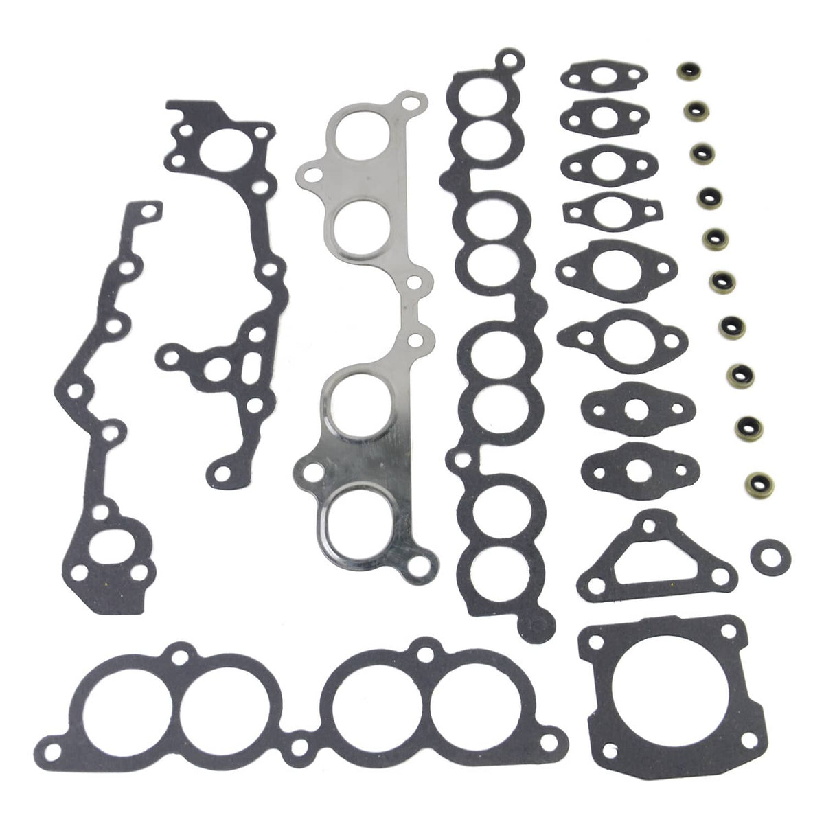 Engine head gasket set with bolts, gasket shapes and small fasteners shown on white.