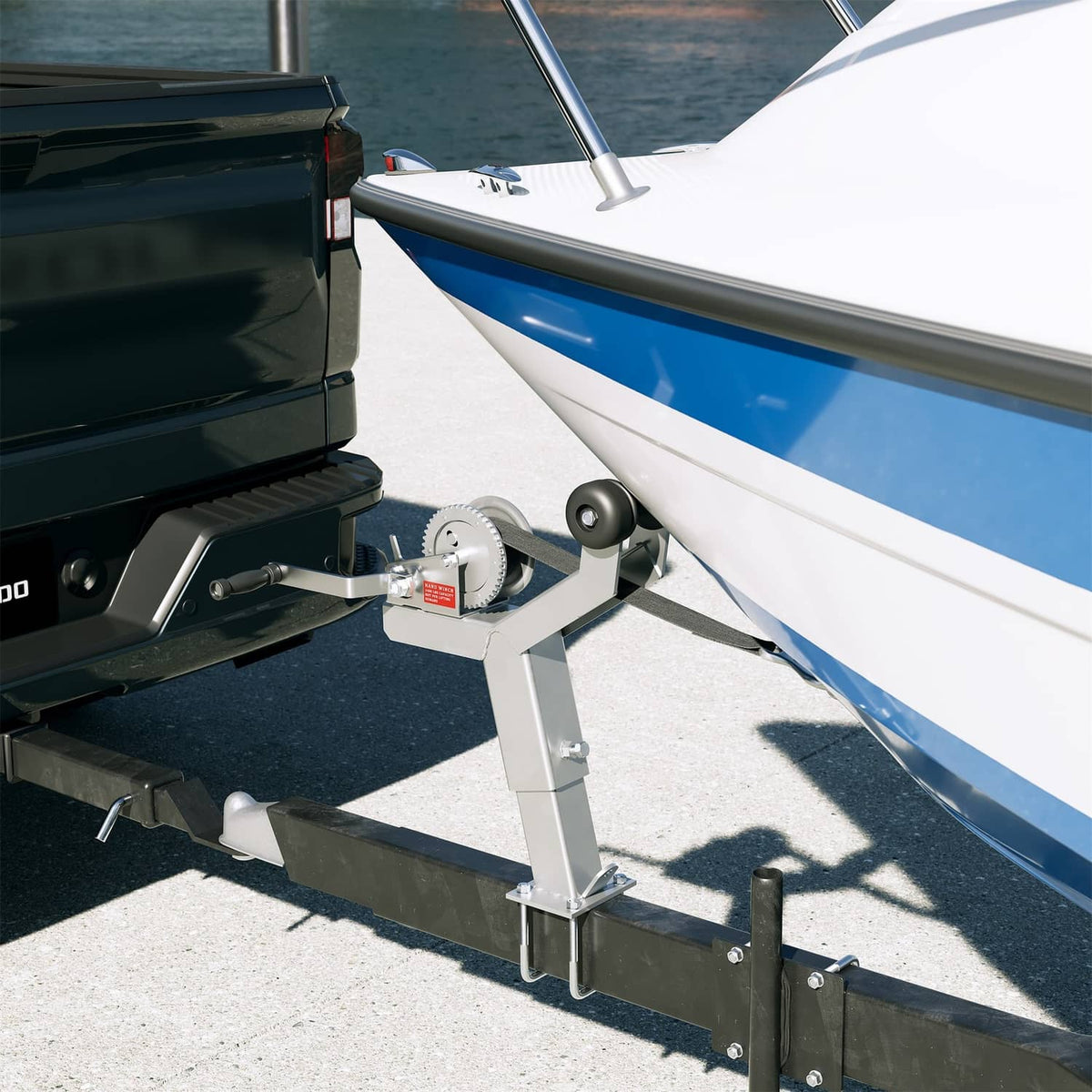 Boat trailer winch stand mounted at the dock with rollers positioned beside the boat.