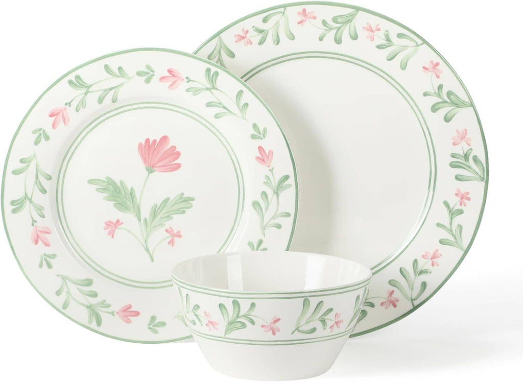 Floral dinner plates and bowl set with green and pink flowers around white borders