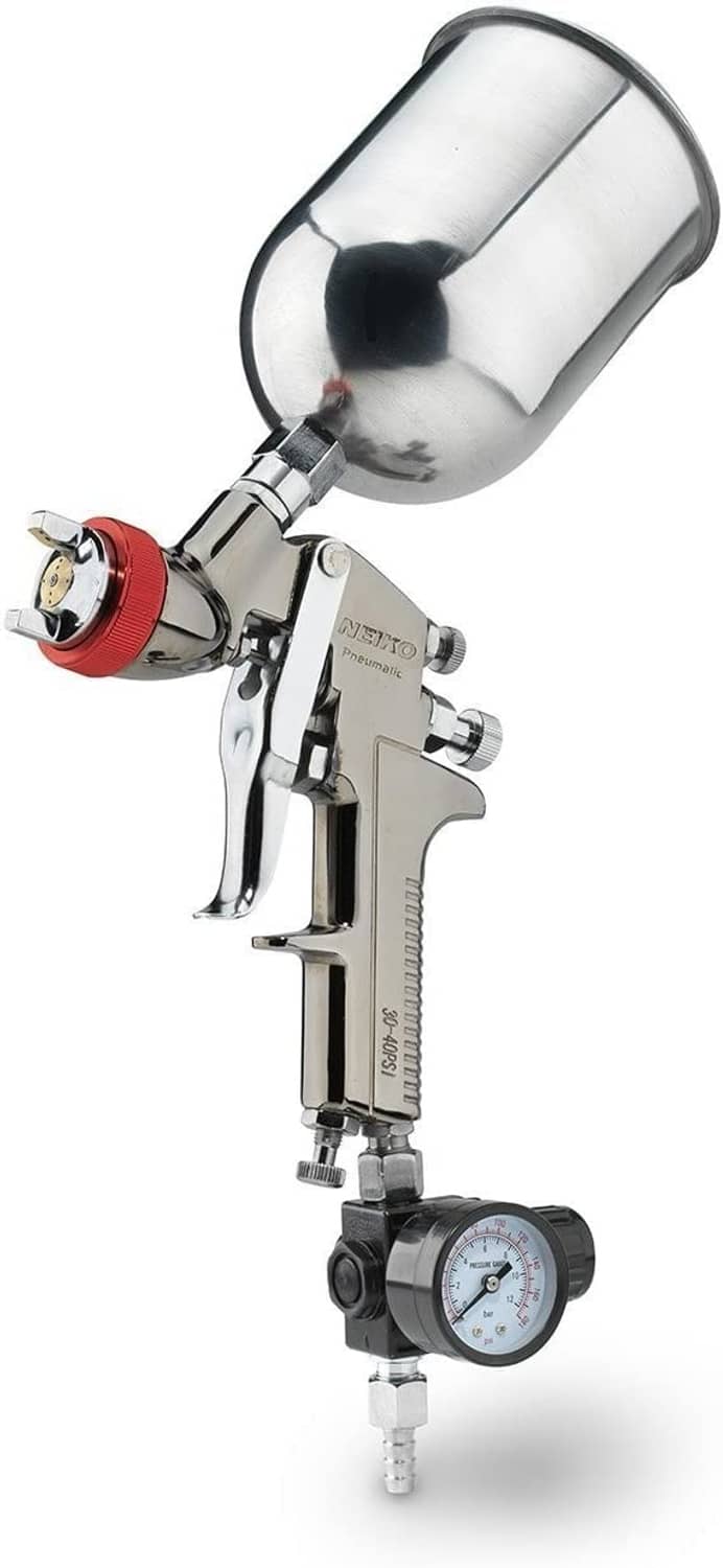 HVLP air spray gun with gravity feed paint cup and red trigger ring, with pressure gauge