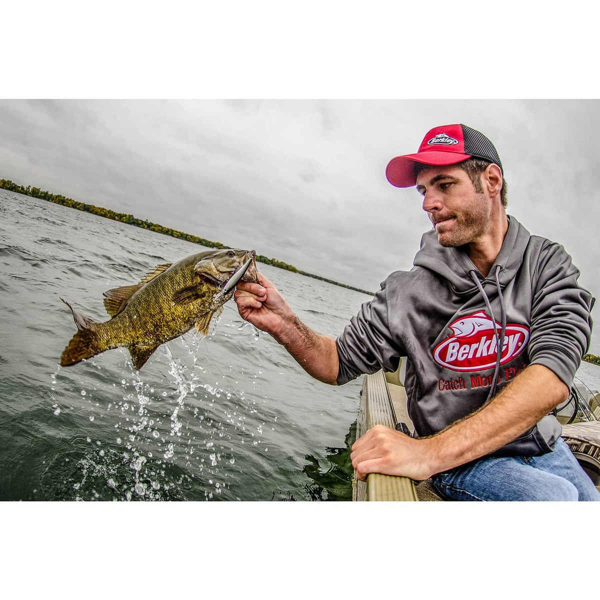 Angler holding a fishing rod on a boat