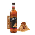 Brown sugar syrup bottle with serving label and brown sugar cubes