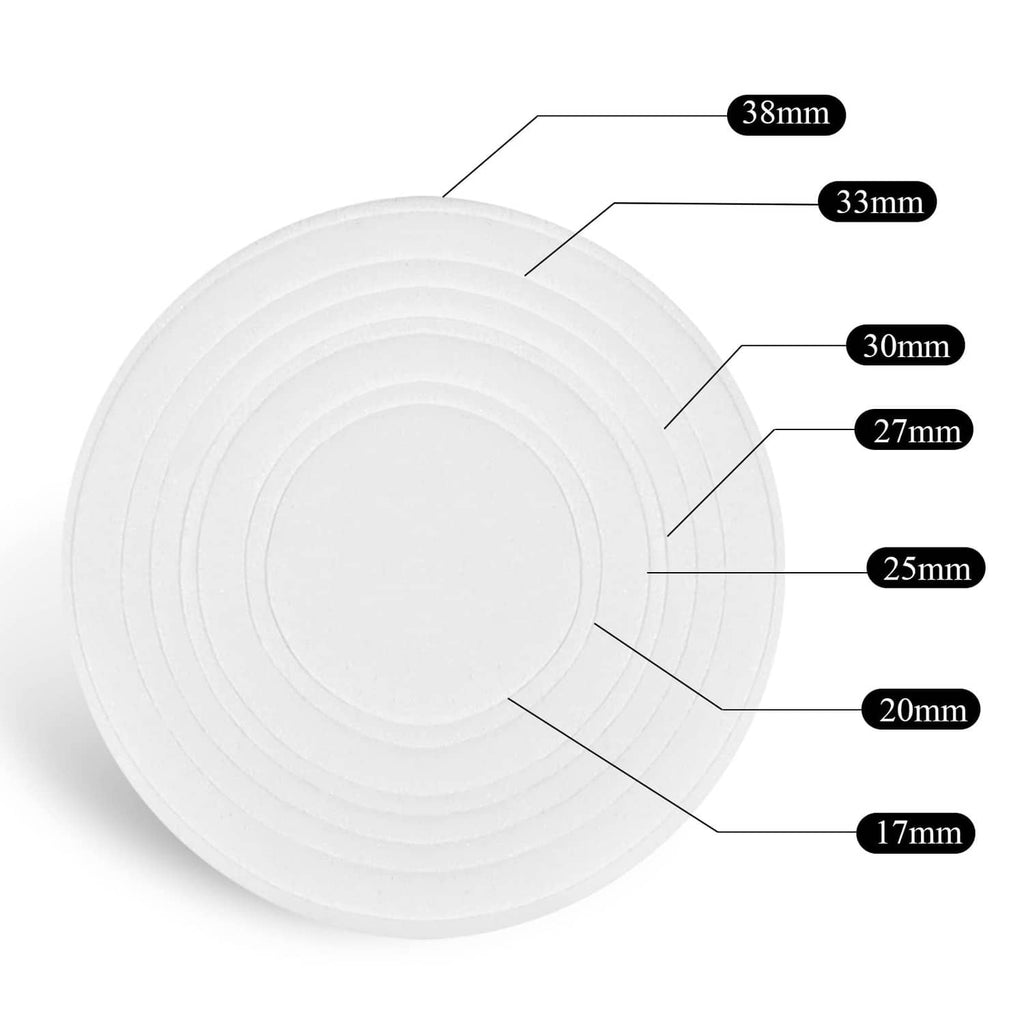 White-tinted clear coin capsule tray with size guide markings on the surface