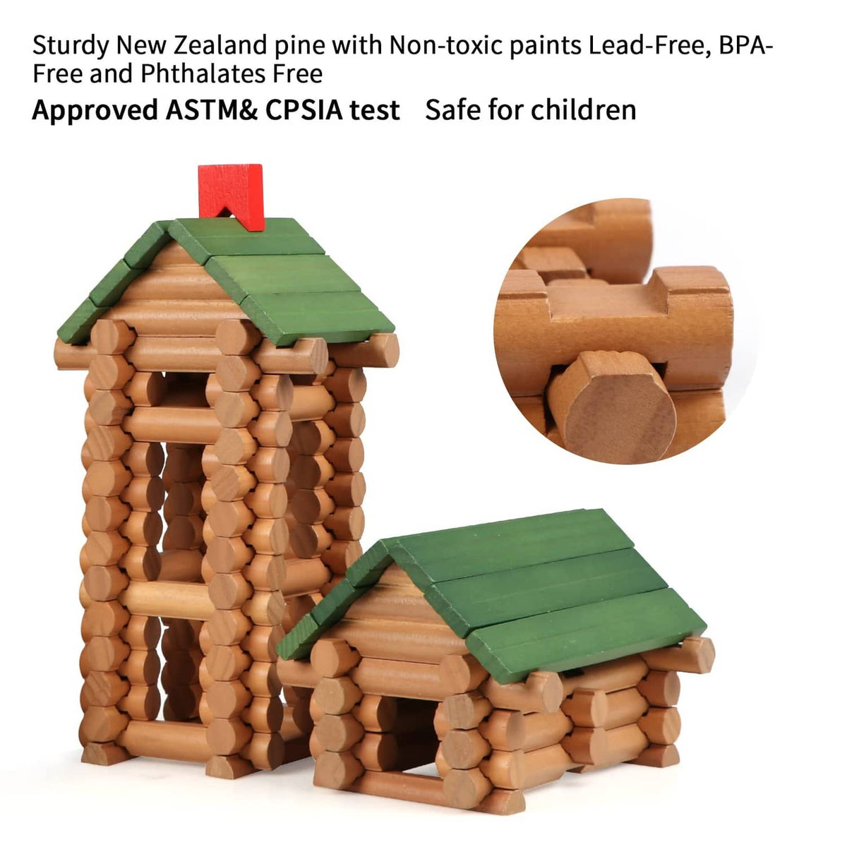 Wooden log building set with two assembled brown log houses and green roofs