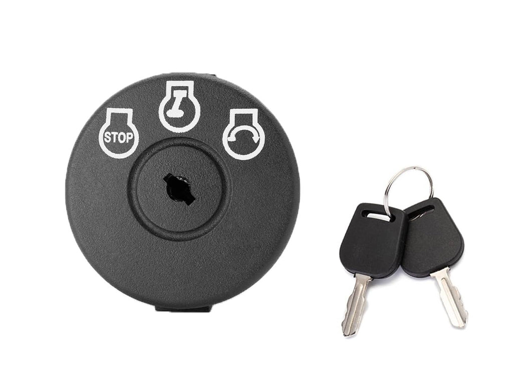 Lawn mower ignition switch with keys and dark round panel labeled stop and start