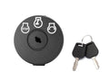 Lawn mower ignition switch with keys and dark round panel labeled stop and start