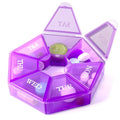 Purple round weekly pill organizer with 7 labeled compartments and clear hinged lids