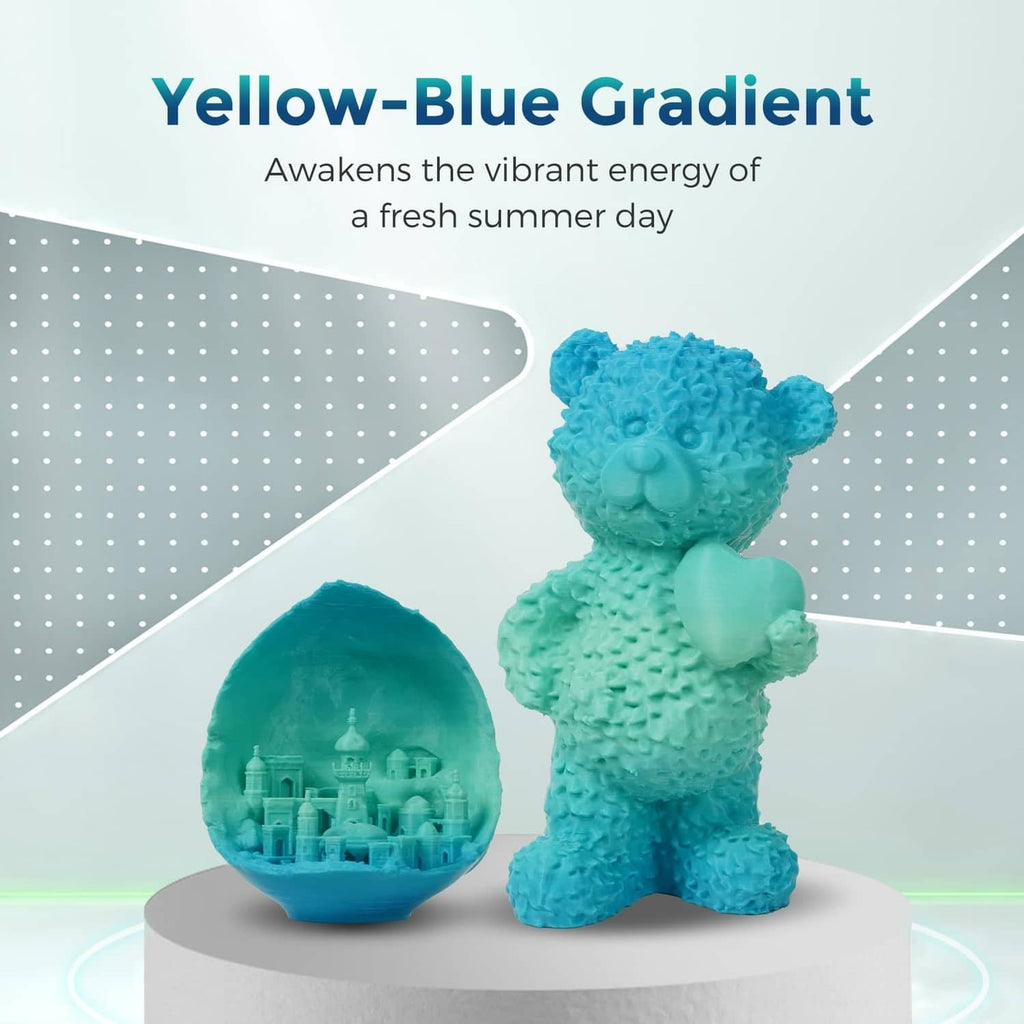 Blue-to-teal gradient PLA filament samples: bear figurine and filled ball