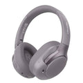 Gray over-ear wireless headphones with side buttons and soft ear cushions