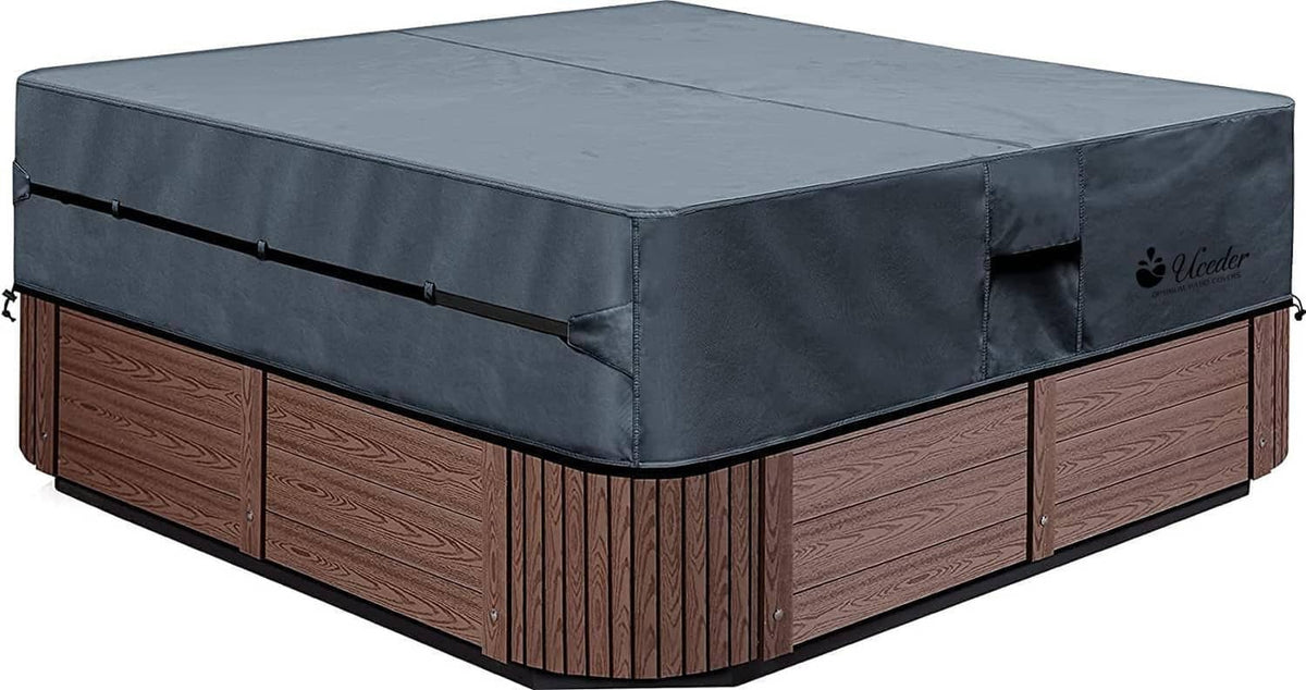 Waterproof hot tub cover, dark gray fitted cover with side ties and front edge panel.