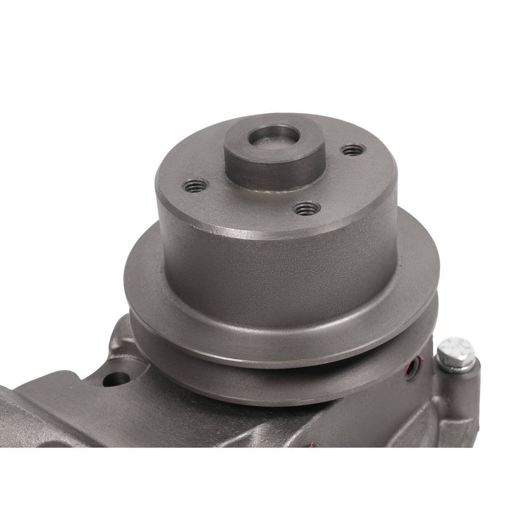 Water pump pulley and mounting plate on gray housing, close-up of round hub
