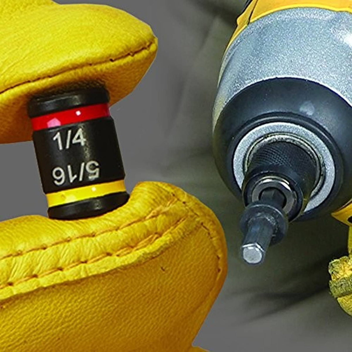 Hex chuck driver bit with 1/4 marking, black body, yellow sleeve and red ring