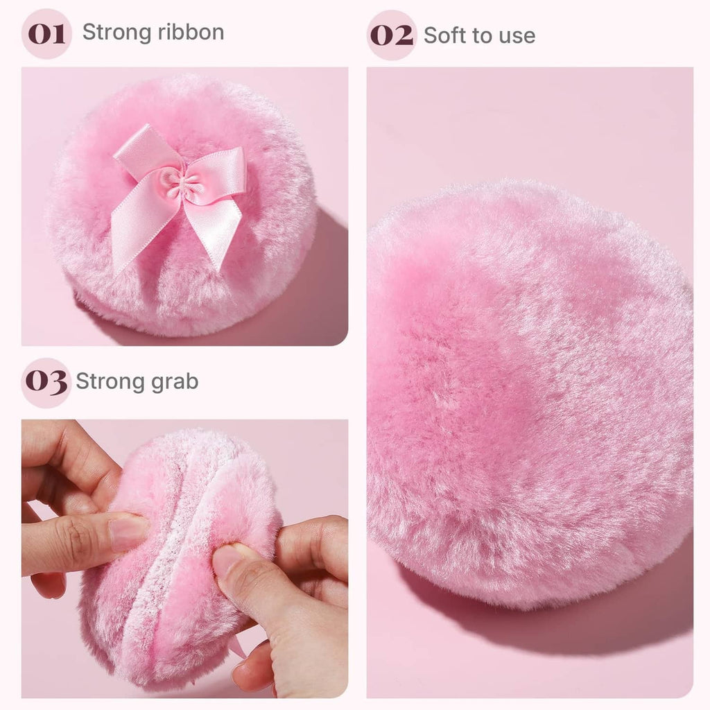 Pink fuzzy powder puff with satin ribbon bow, close-up detail