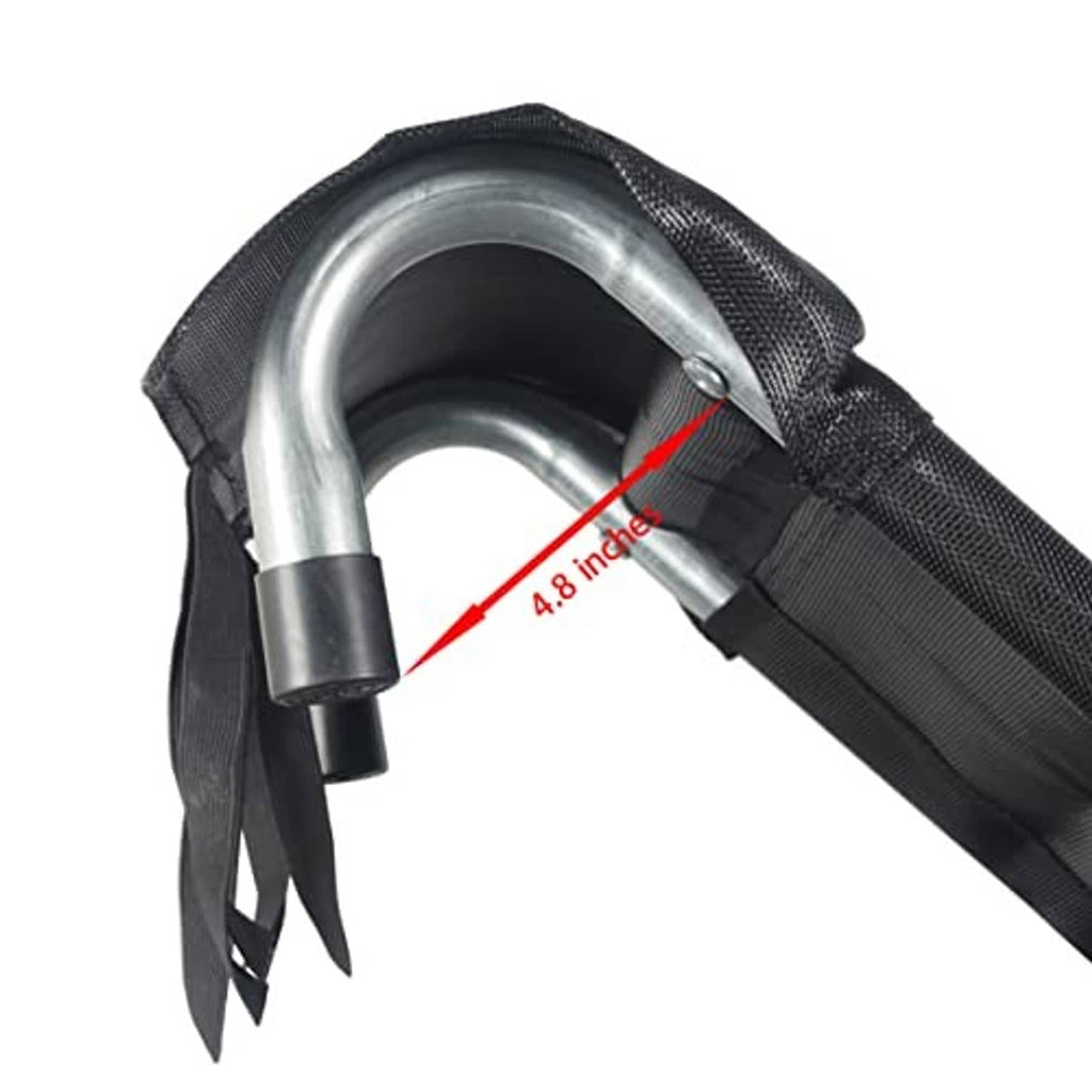 Curved metal handrail at the slide entry with black fabric cover and stitching