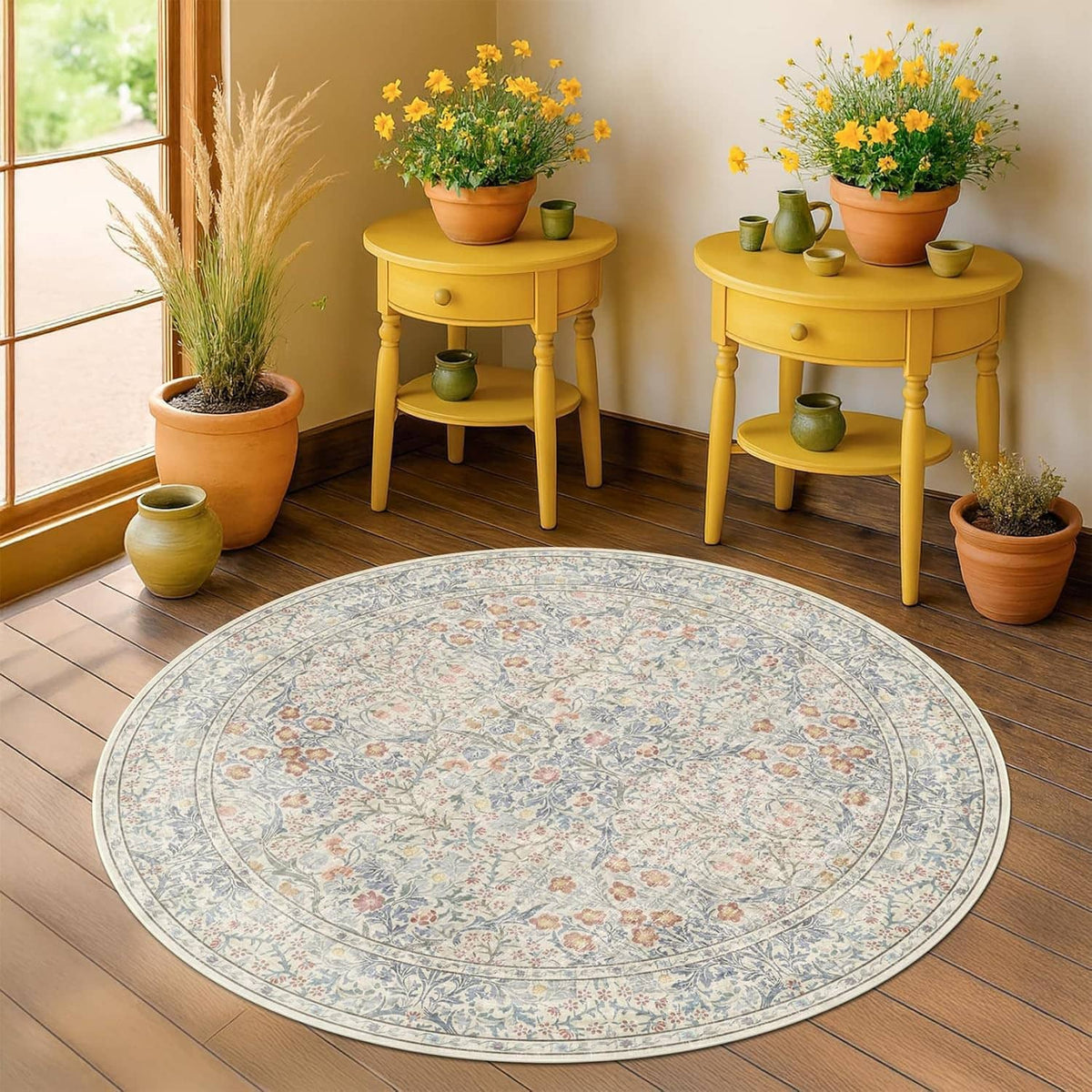 3 ft round blue floral rug centered on hardwood floor with subtle beige accents