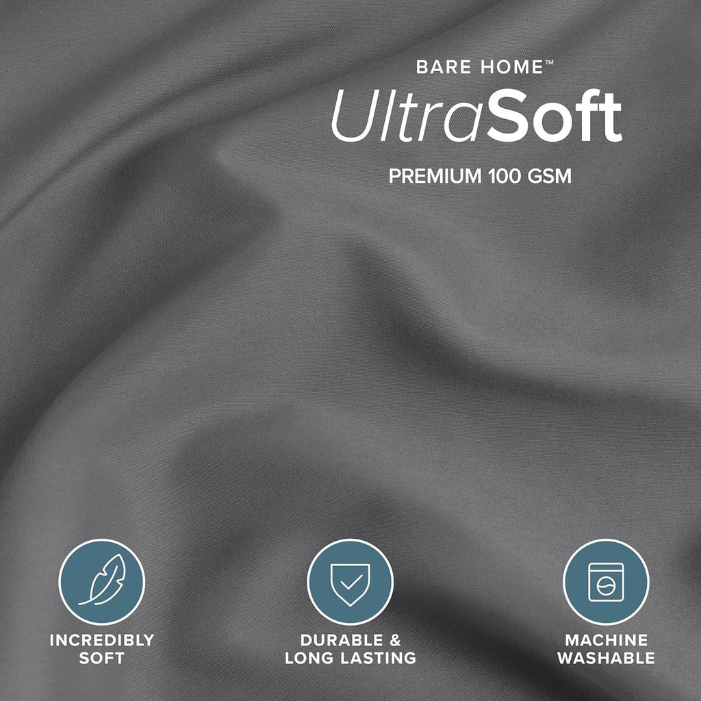 Dark gray duvet cover fabric close-up, smooth satin-like finish.