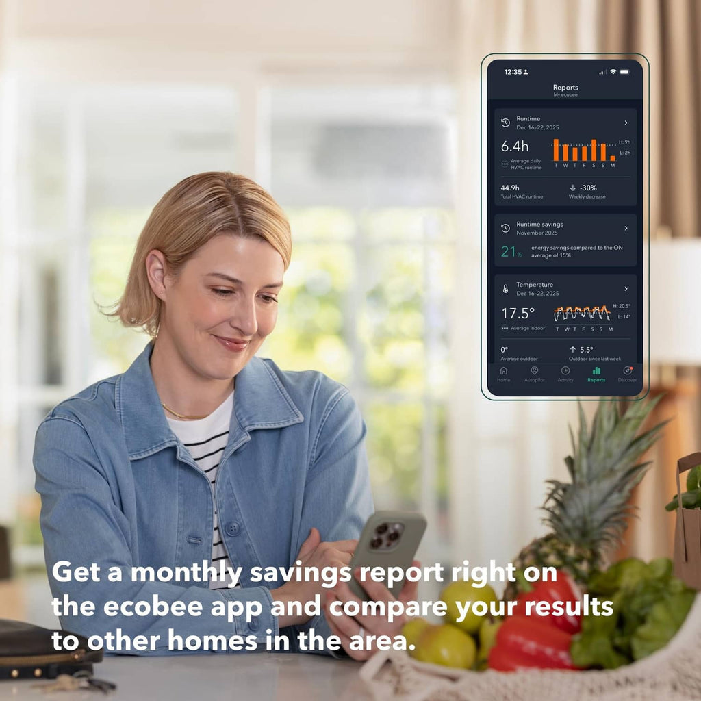 Smartphone app beside black ecobee thermostat showing 72 and energy savings charts