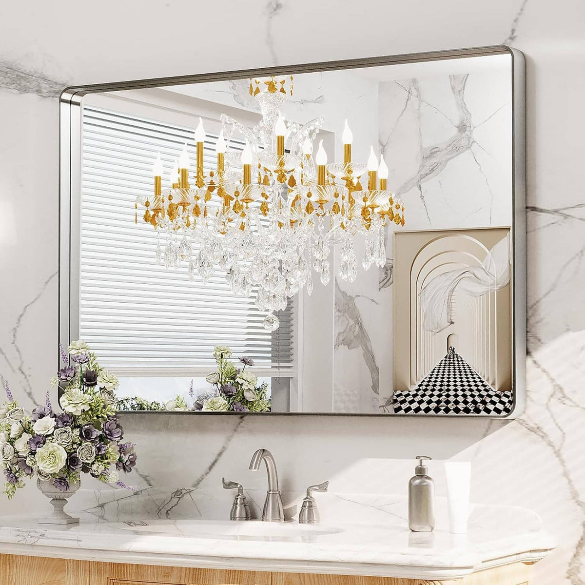 Bathroom mirror with rounded rectangle brushed nickel frame and clear reflective tempered glass
