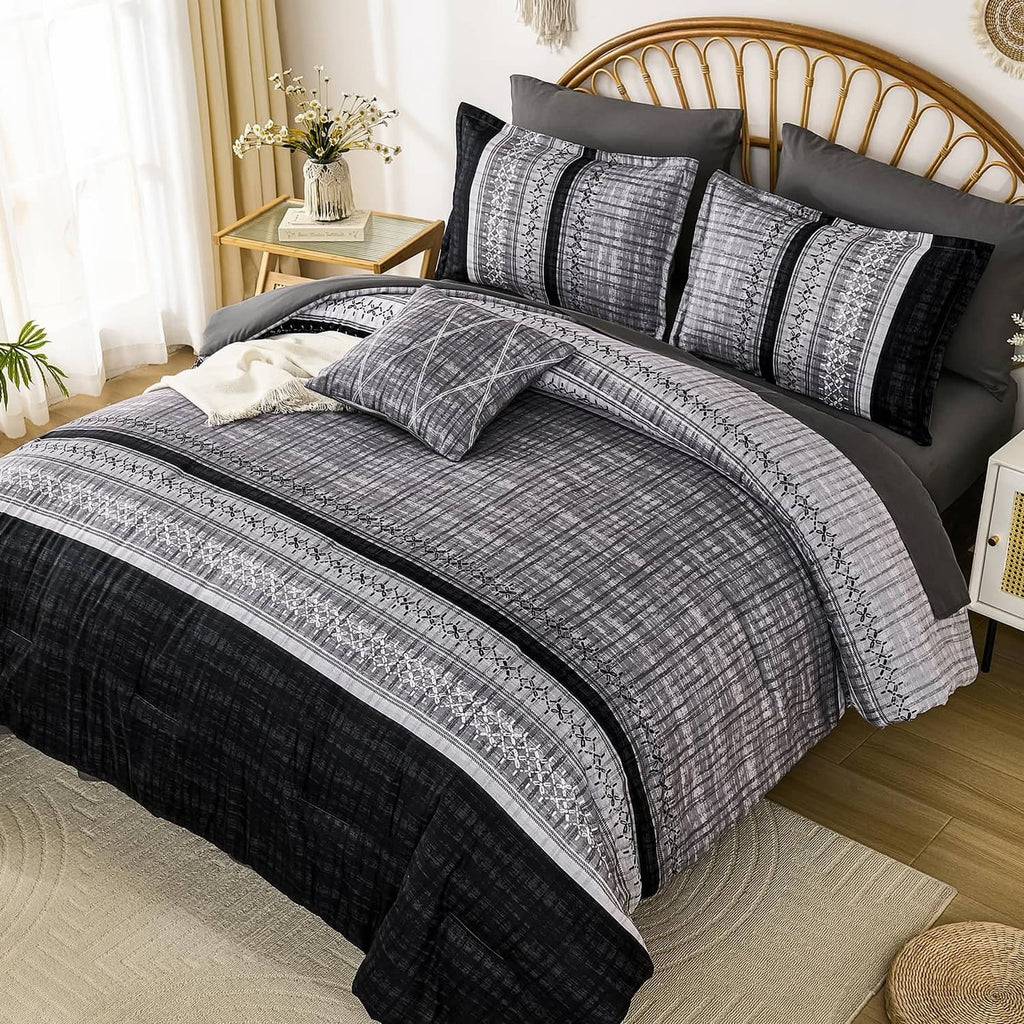 Black and gray comforter set with ornate stripe and geometric bands, king bed style