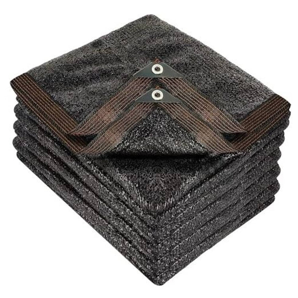 Black mesh shade cloth with reinforced corner grommets and tie loops, neatly stacked