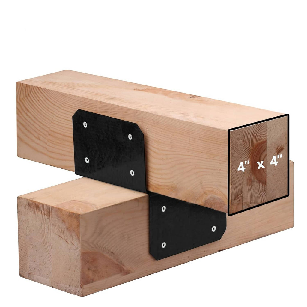 Black 4x4 joist anchor connector post cap fastened to pressure-treated lumber